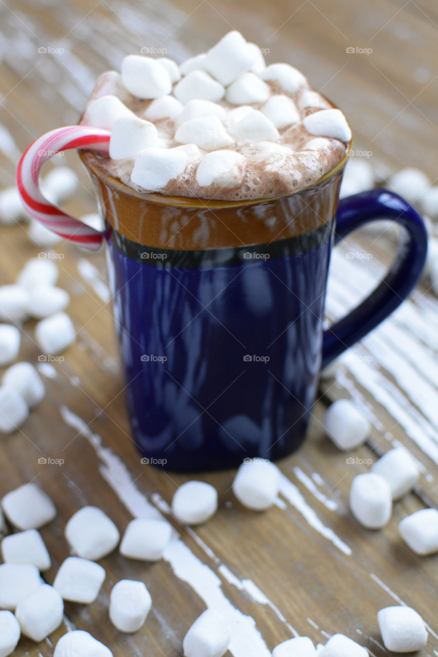 Mug of hot chocolate topped with marshmallows