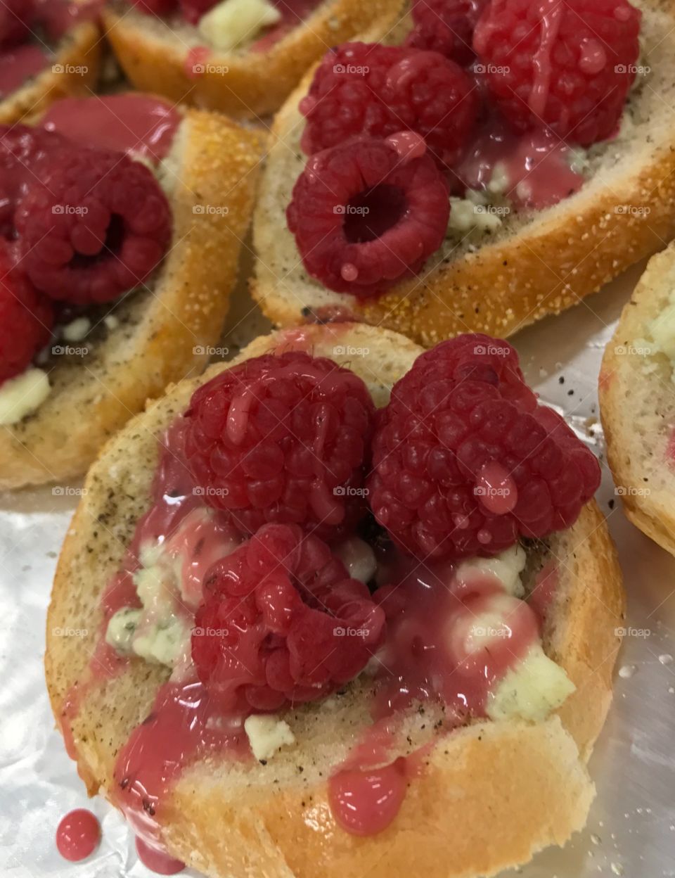 Raspberry crostini closeup 