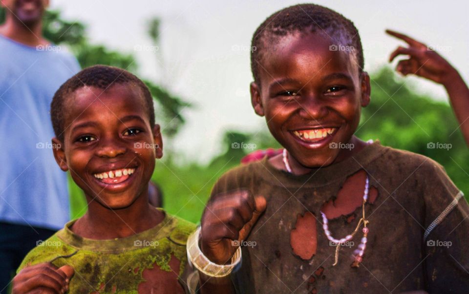 Happy faces. I was walking through a rural village in Uganda when I came upon a group of children, including these two boys