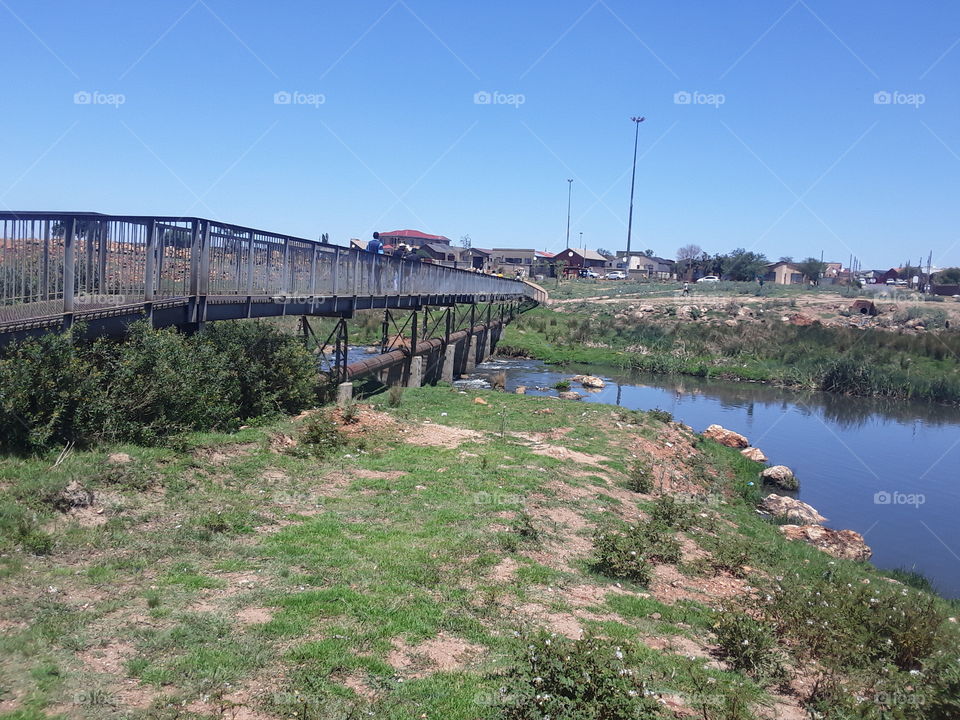 A foot bridge across the river.