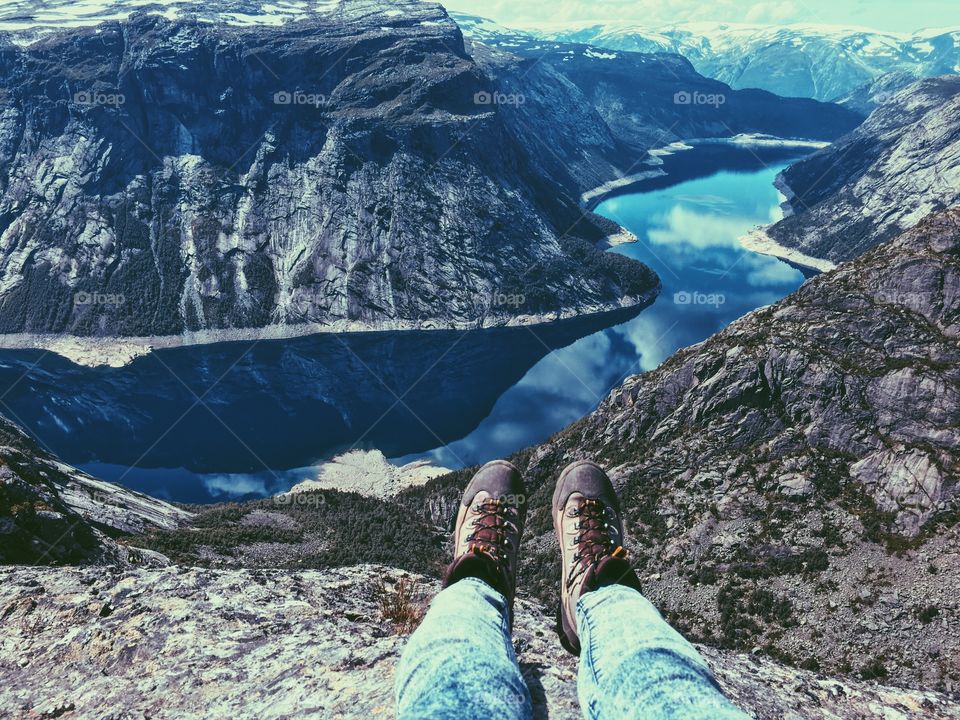 Feet view at amazing Trolltunga 