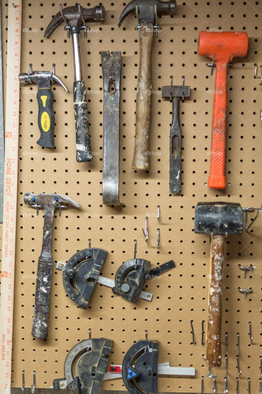 Handtools hanging on the pegboard