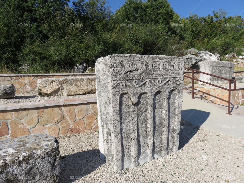 Medieval stone slab with arches