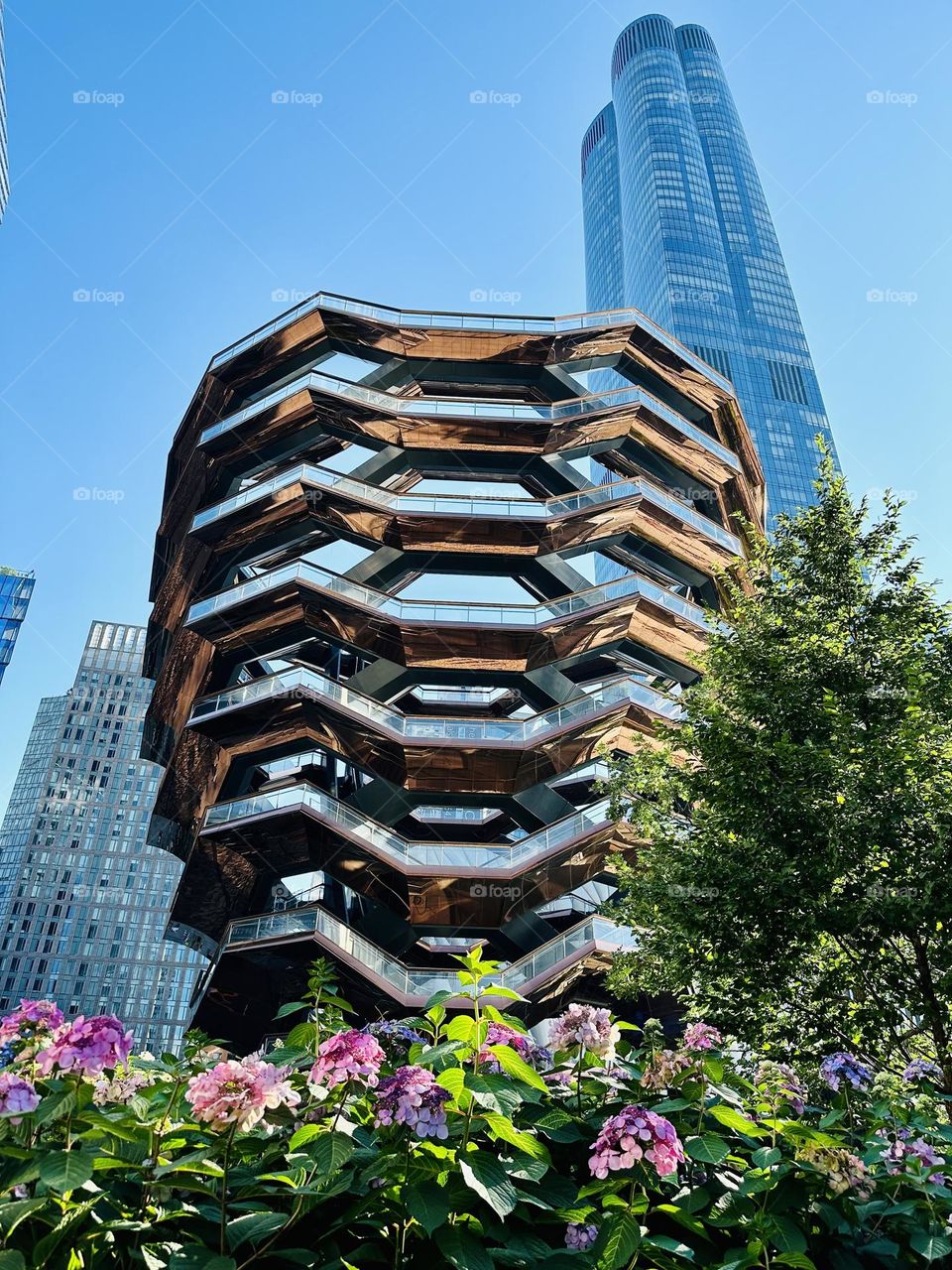 This bold, beehive-looking structure, known as The Vessel is one of the most iconic buildings located at the Hudson Yards New York City.