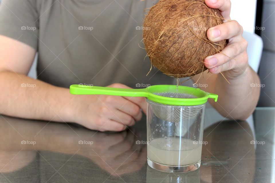 Squeezing the coconut