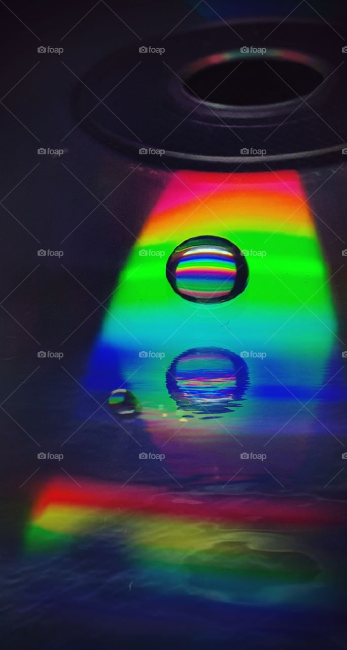 Close up texture shot of a rainbow colour mysterious object