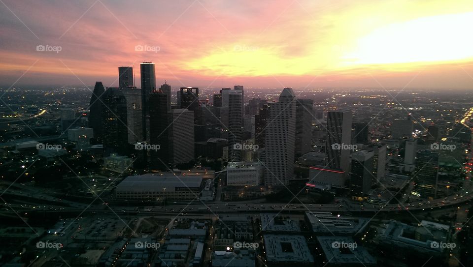 Houston at sunrise. an aerial shot of Houston Texas at sunrise