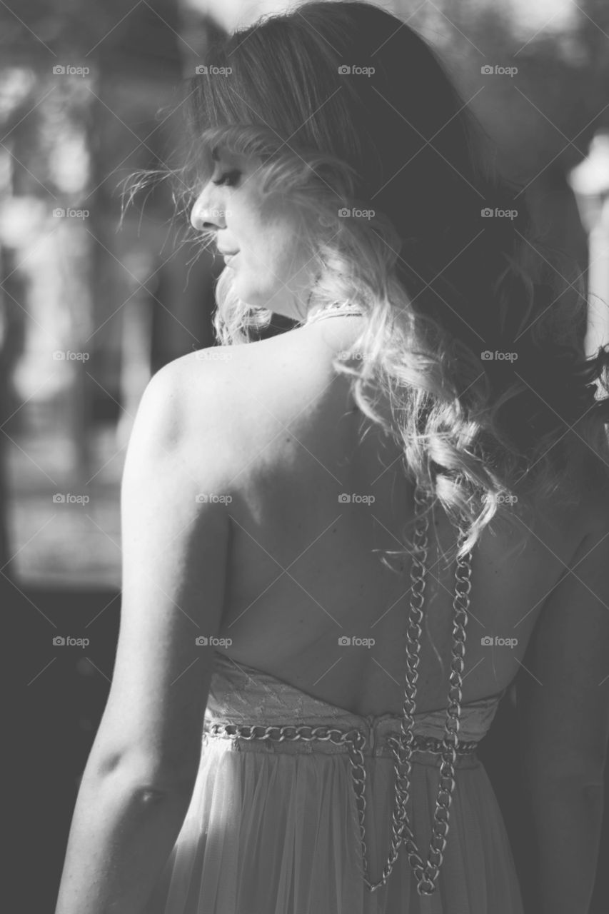 woman portrait. woman in beautiful evening gown posing,monochrome