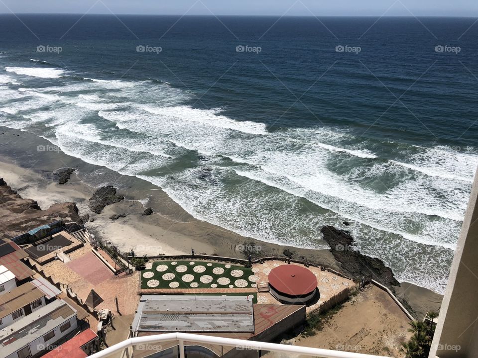 Picture of Tijuana Beach from top floor of a Penthouse awesome wave  