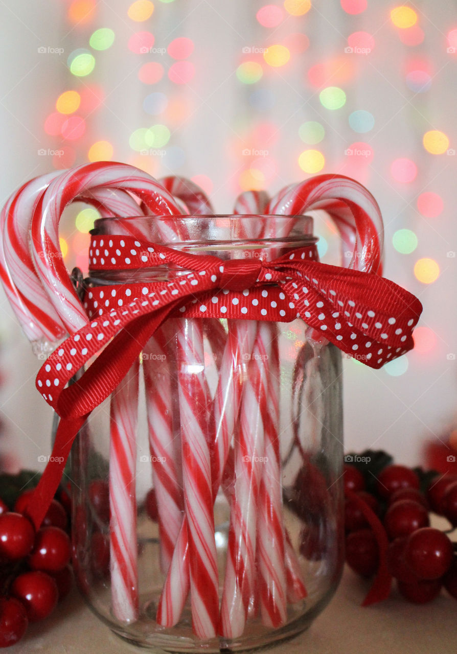 Candy cane in glass jar