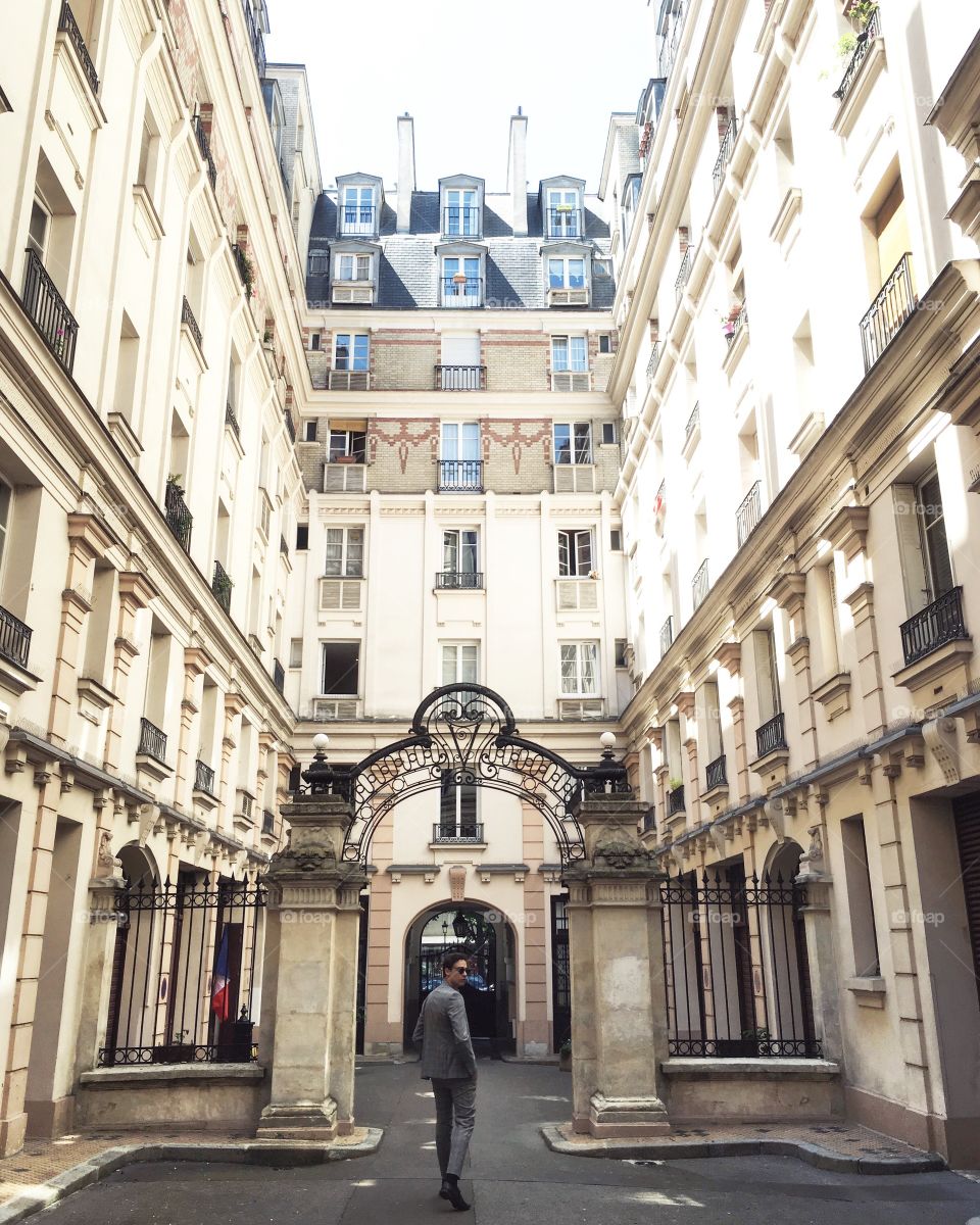 Boy and architecture in Paris, France 
