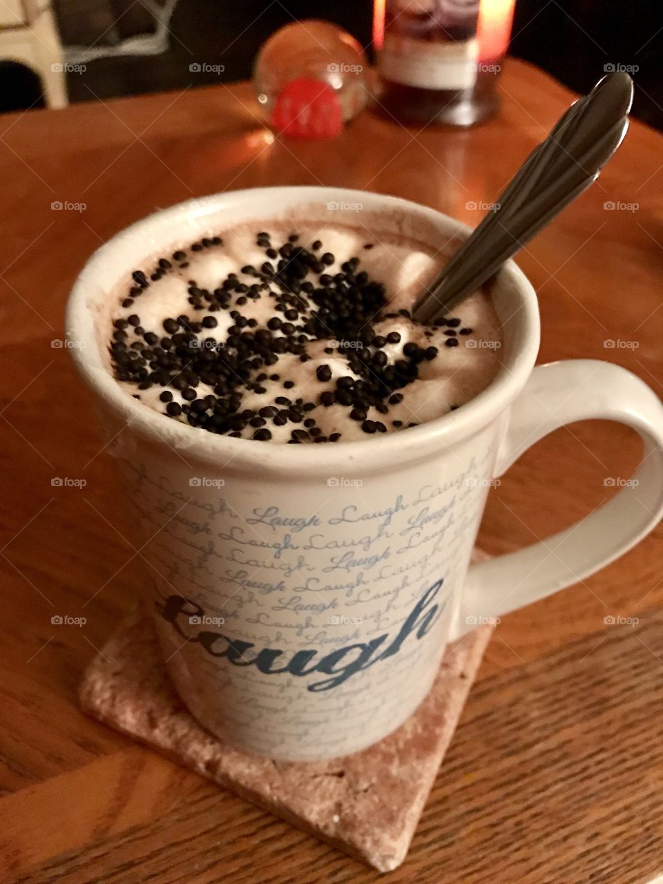 Hot chocolate homemade topped with marshmallows and sprinkles  