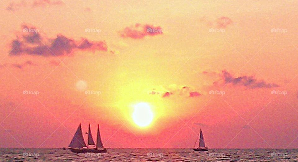 Sunset Sails on the Horizon