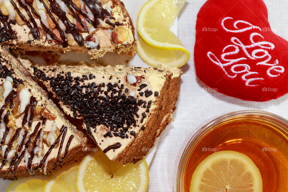 cake and a tea with lemon