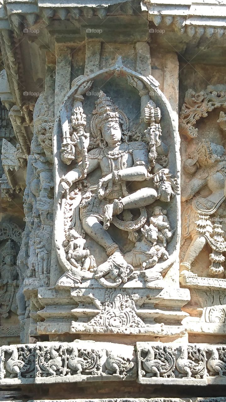 Halebeedu - Kedareshwara Temple - statue portrays lord shiva killing the demon Gajasura - Gajasurasamhara