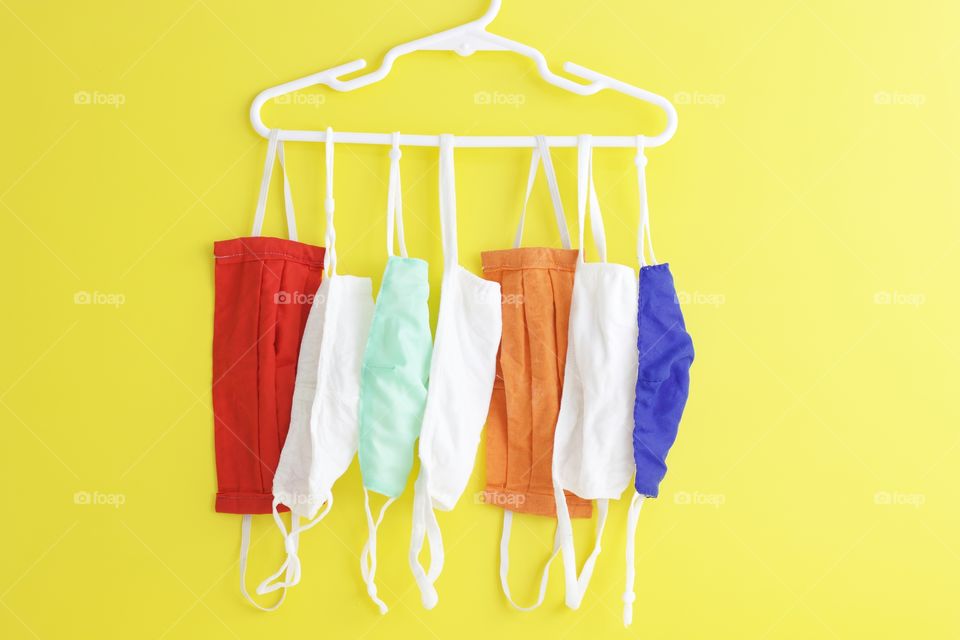 Colorful face masks drying after being washed. These are now a fixture in our wardrobe.