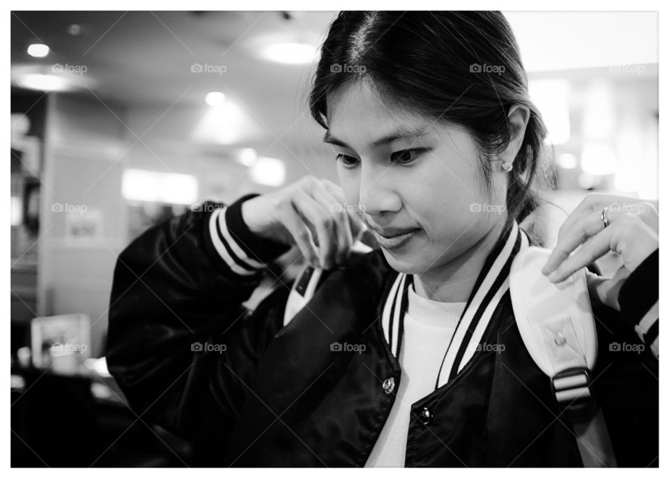 Japanese girl in baseball jacket