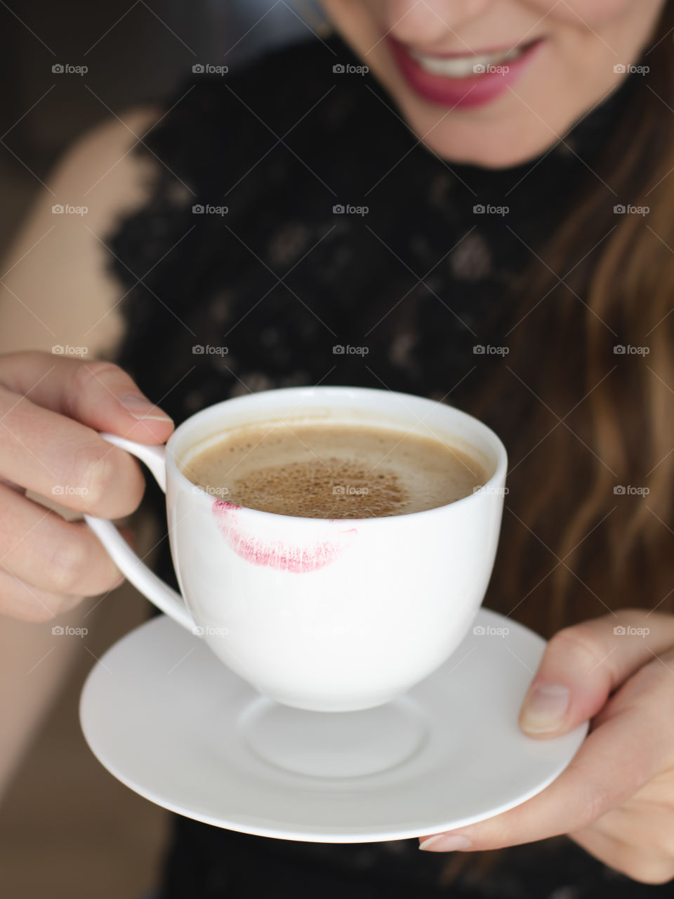 Young woman drinking coffee, white coffee cup with red lipstick 