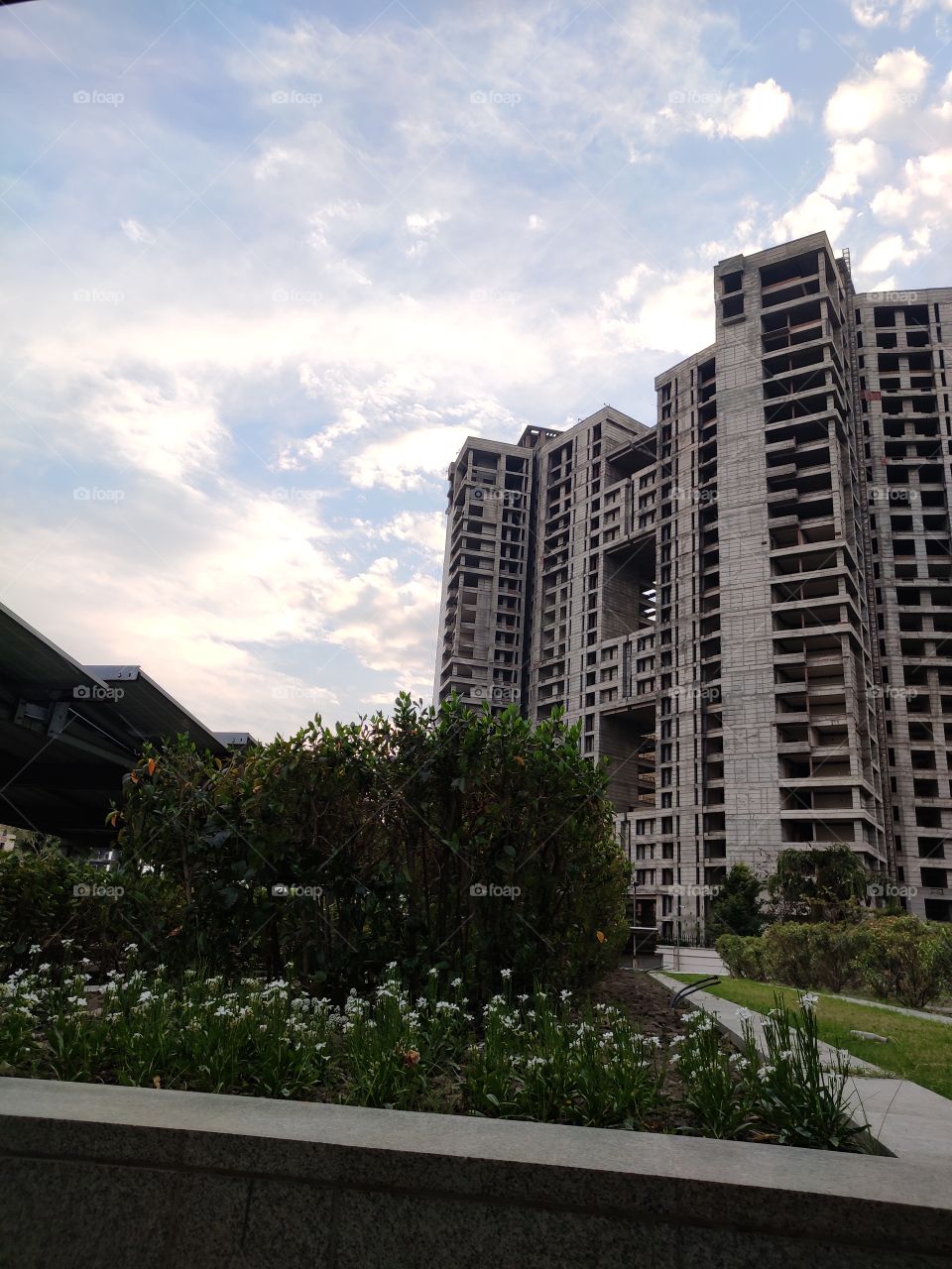 clouds in the background of a building.