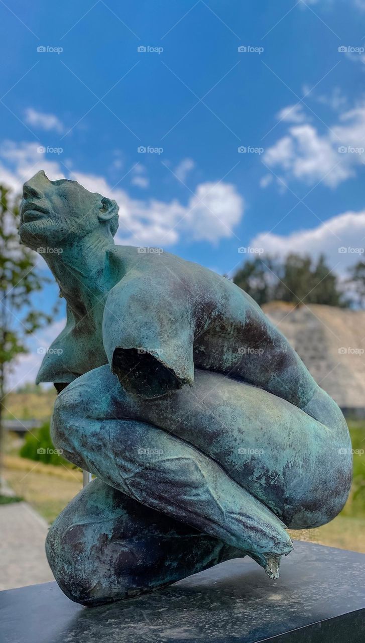 Bbroken man sculpture