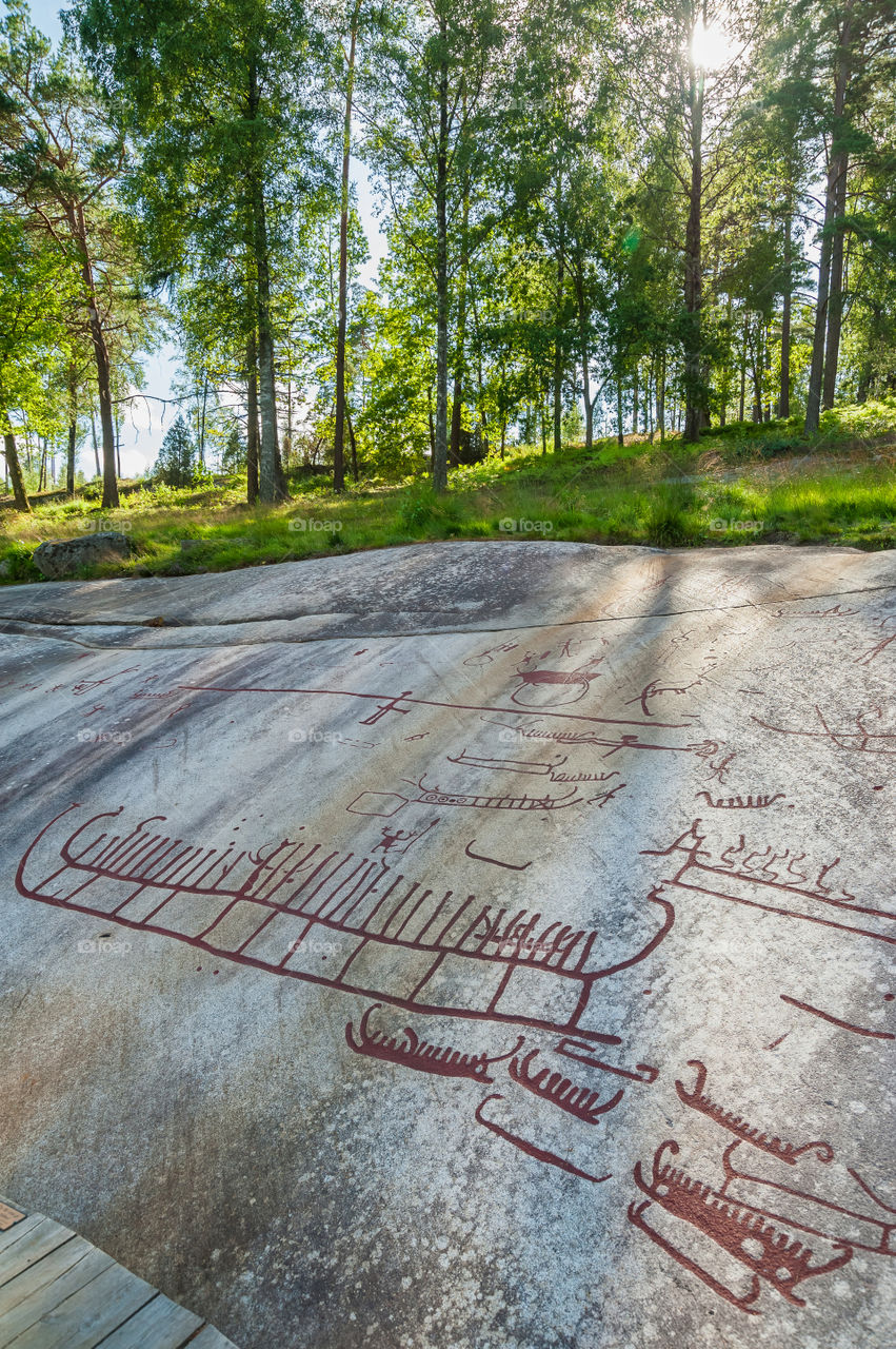 Ancient graffiti. Drawings carved in rocks. Tanum Rock Carvings. Bohuslan. Sweden. Europe