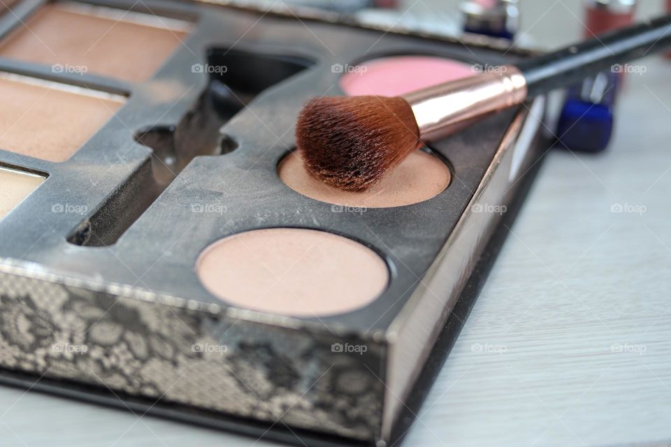 Blush powder in use