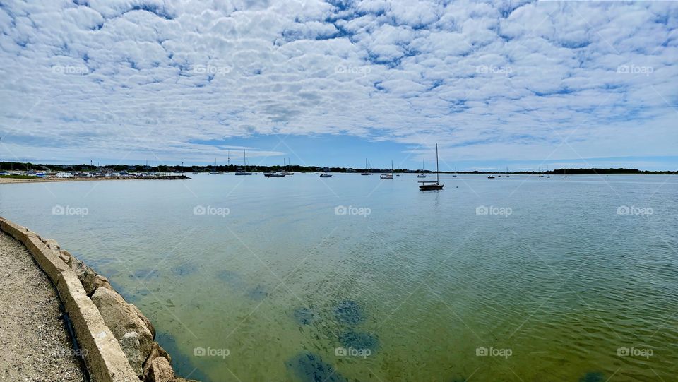 Lewis Bay, West Yarmouth, Cape Cod.  Boats across horizon.  July 2021