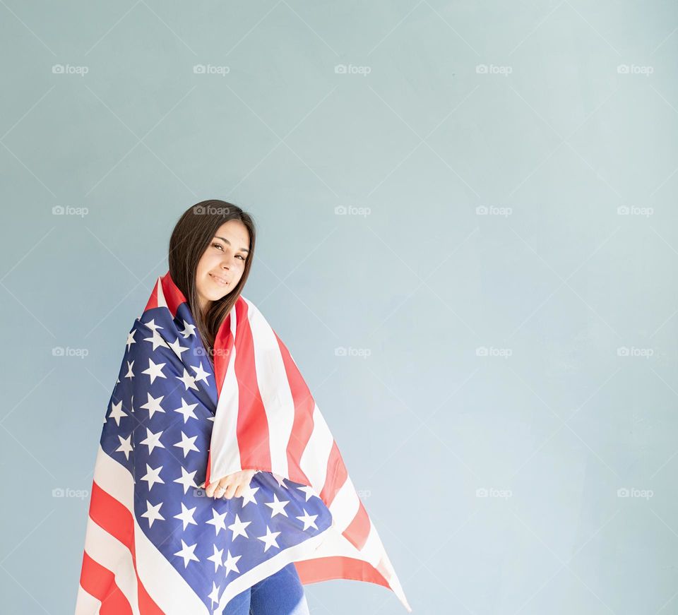 woman holding USA flag