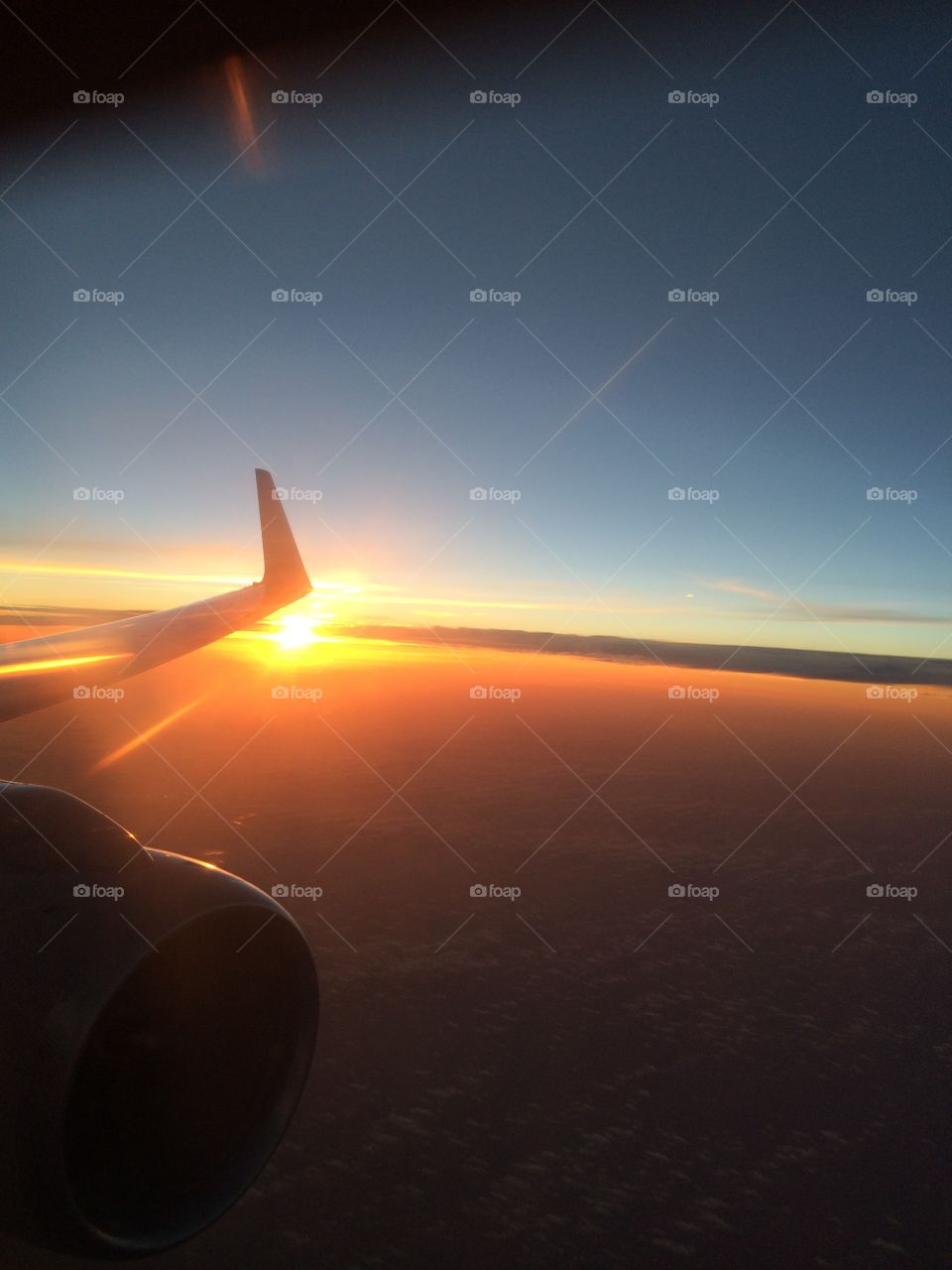 Sunset over planes wing 