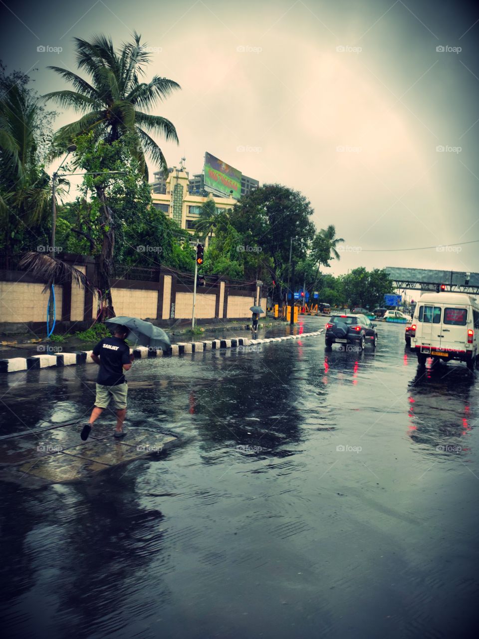 Pleasant weather
cat and Dog Rain💧💧💧
Clouds in sky🌩️🌨️🌩️🌦️
Awesome Flora 🌲🌳🌴🍀☘️🌿🌱
Man Walking with Umbrella🚶⛱️⛱️
Vehicles on Road🚗🚗
City