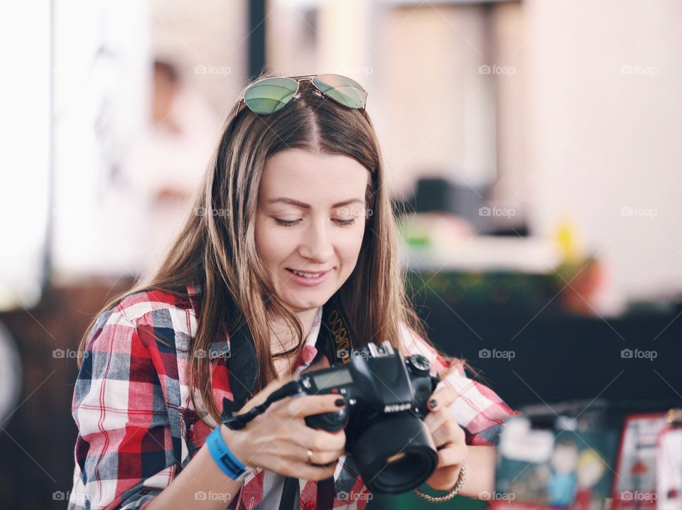 Girl photographer with camera