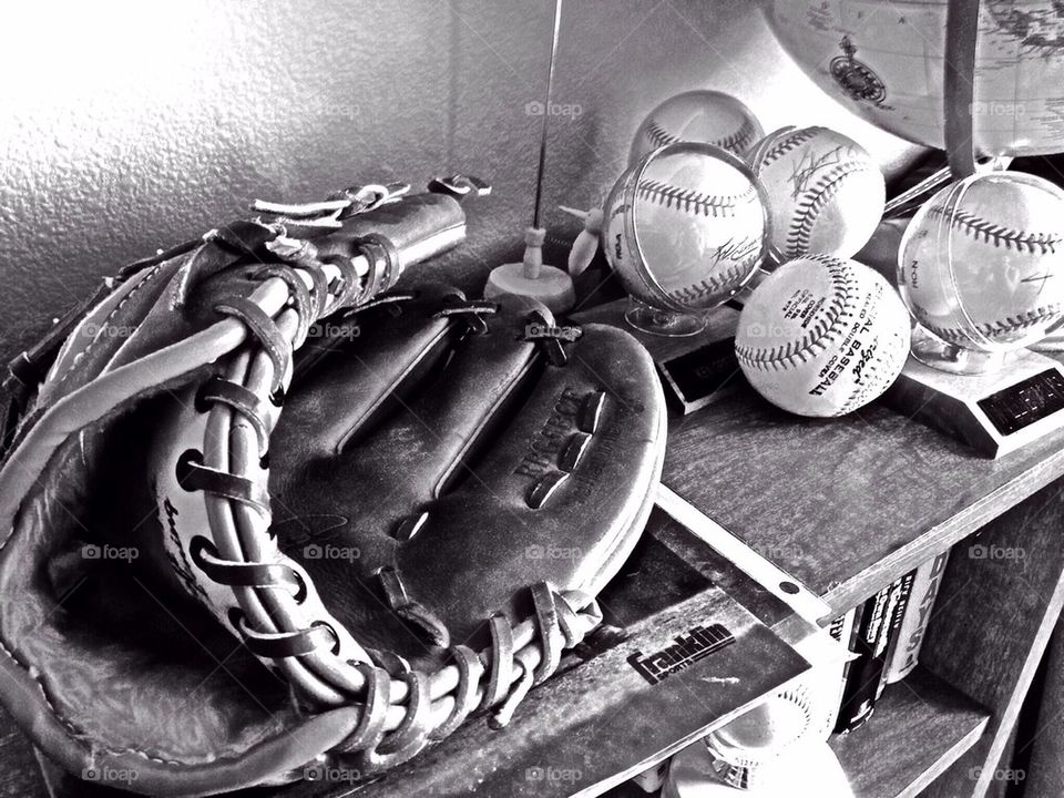 Baseballs and glove