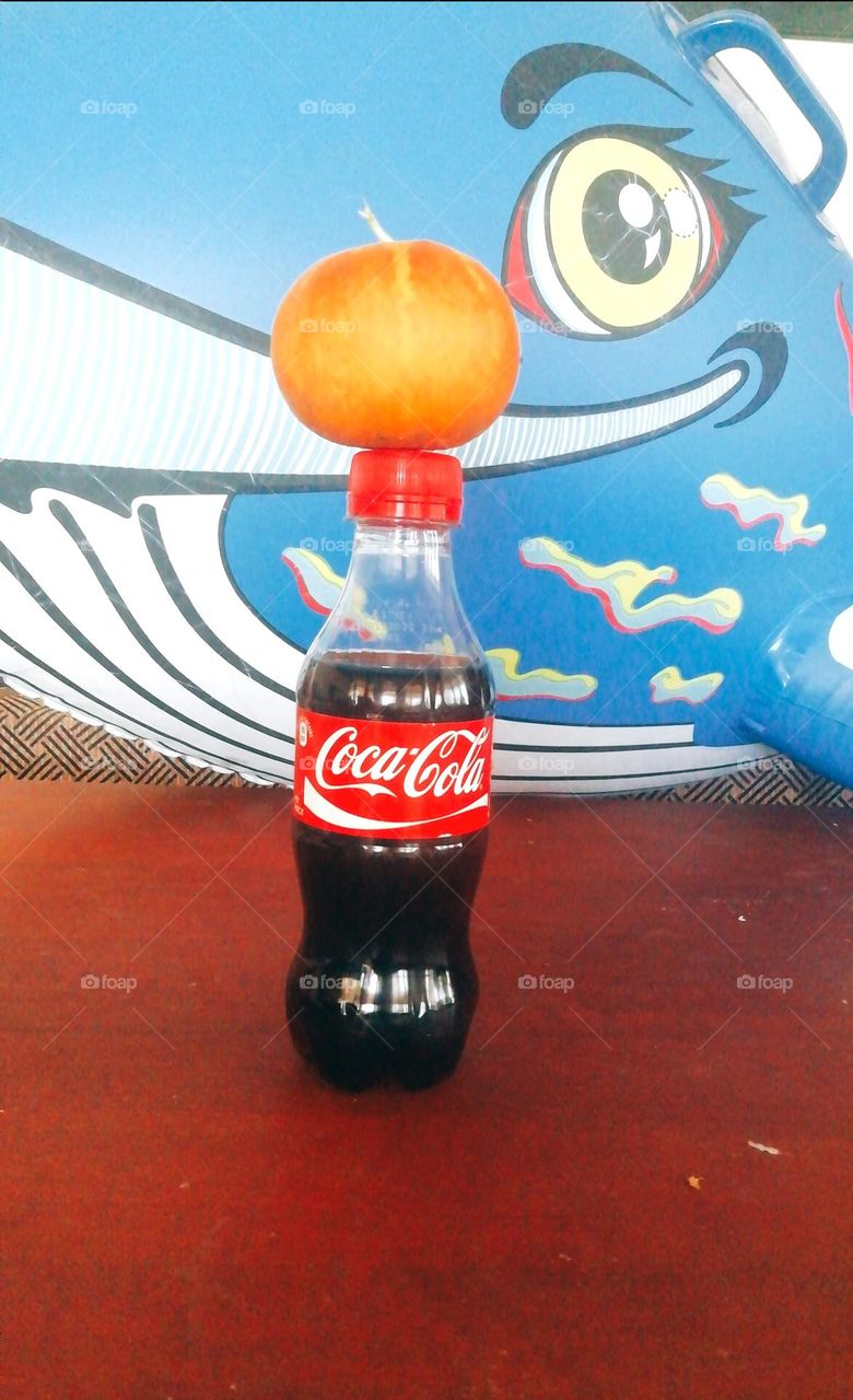 Coca-Cola balance fruit