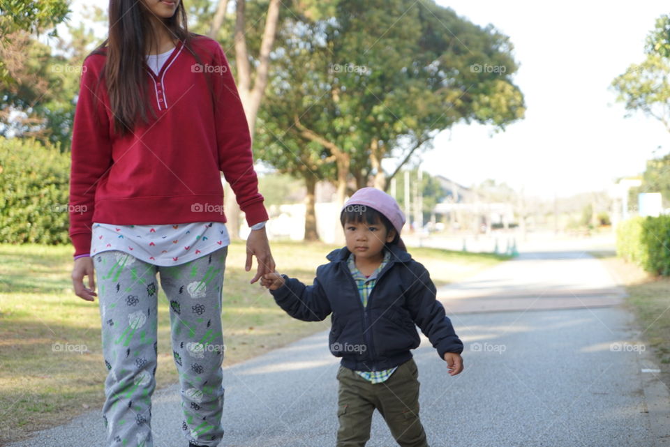 Japanese family walking in Fukuoka park