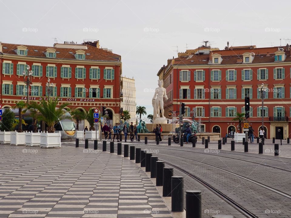 The view of tram and fountain on the Place Massena in Nice, France.