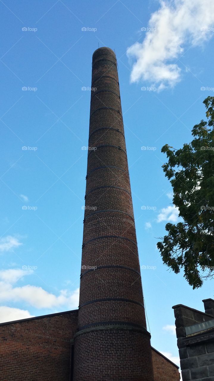 smokestack tower. a smokestack from an old mill in the amanas