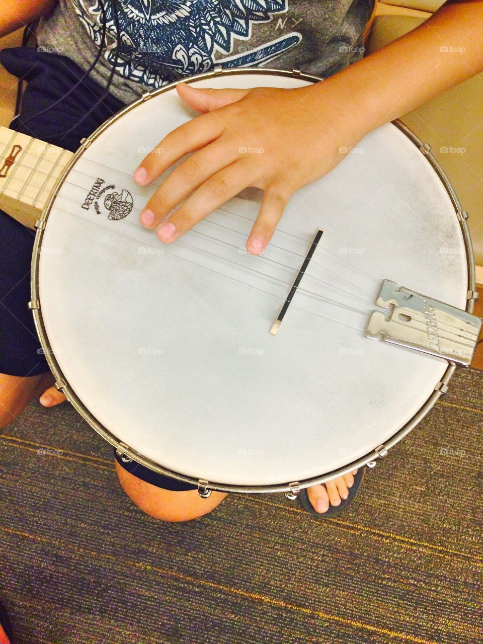 Boy playing banjo