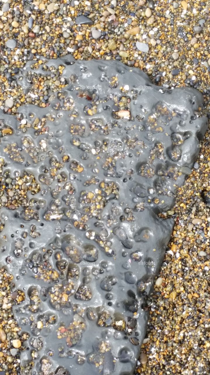 Ocean Rocks. a random rock on the beach of Newport Beach Oregon