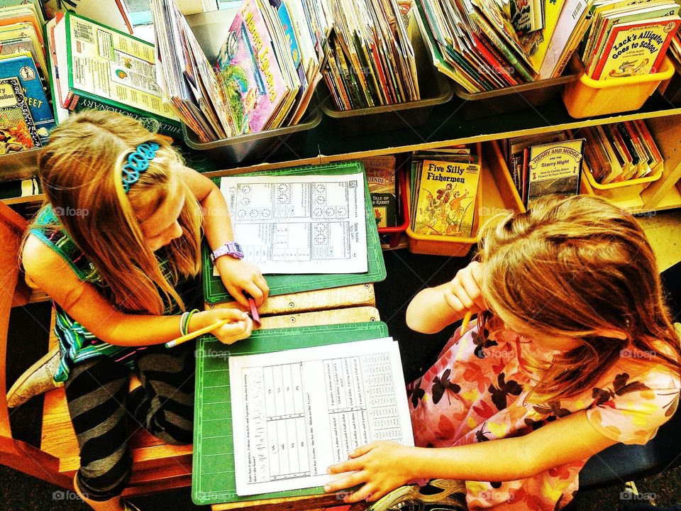 Young Children Reading At School