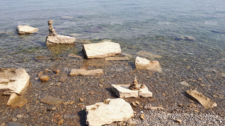 Stone towers on the beach