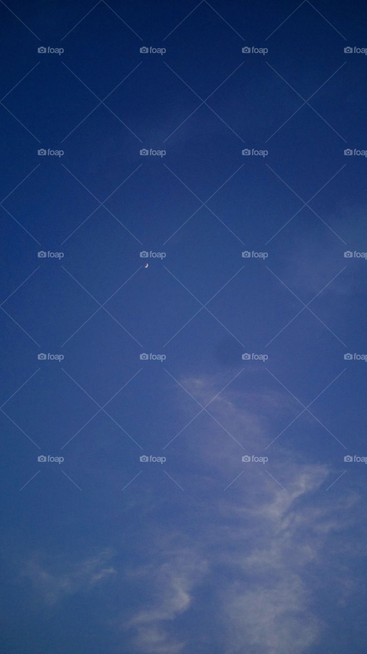 the beautiful blue sky at moon and clouds