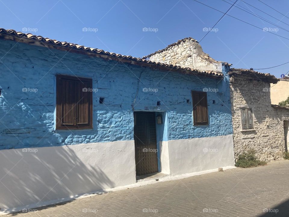 Empty old buildings Summertime in Kusadasi, Turkey. Sunny day in charming sunny city. Ocean and blue sky. Colorful lovely city of Turkey. Summer vacation trips are my favorite. 