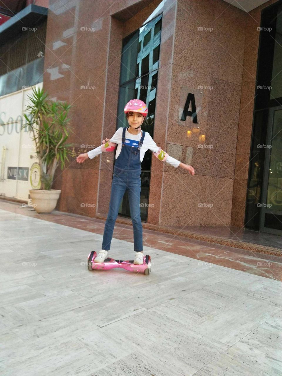 A child on electric skate.