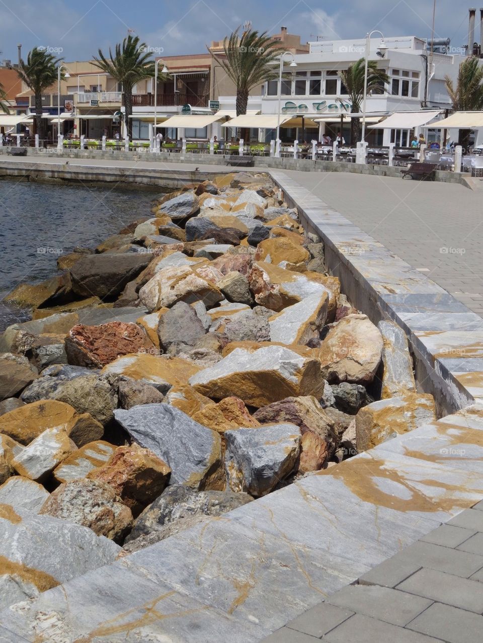 Colourful rocks on the waterfront