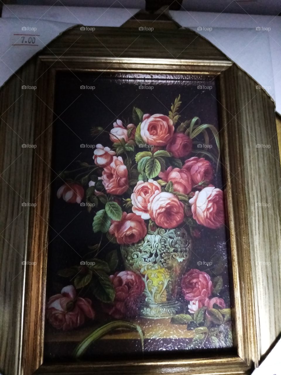 Photo of framed vase of pink roses