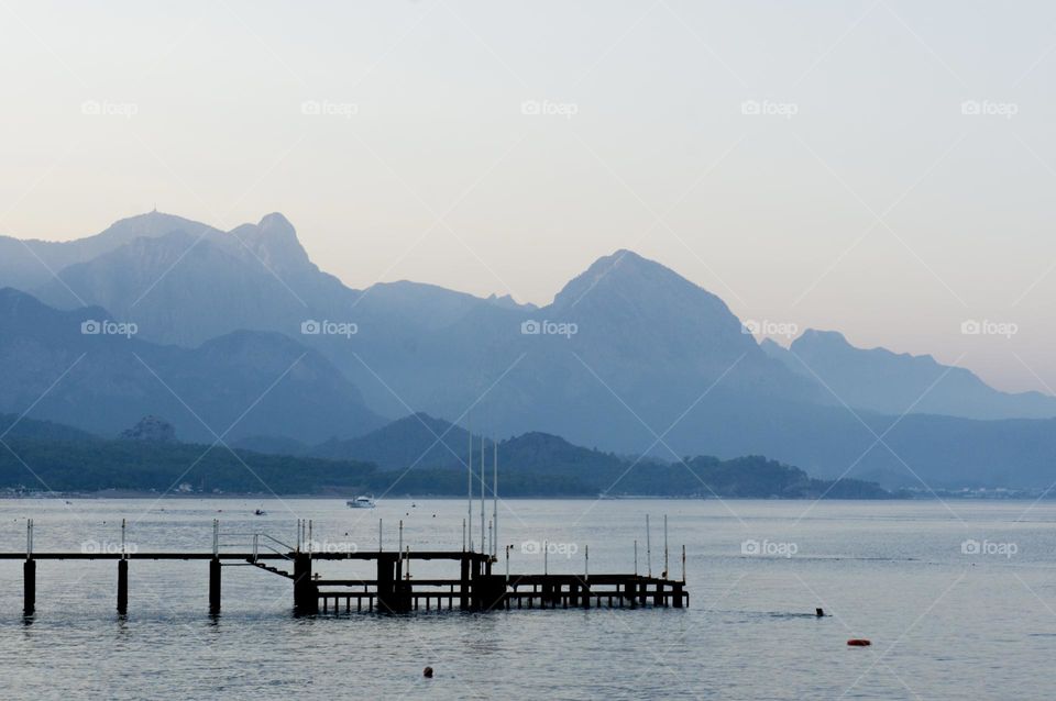 Sea and mountain, pastel blue color 