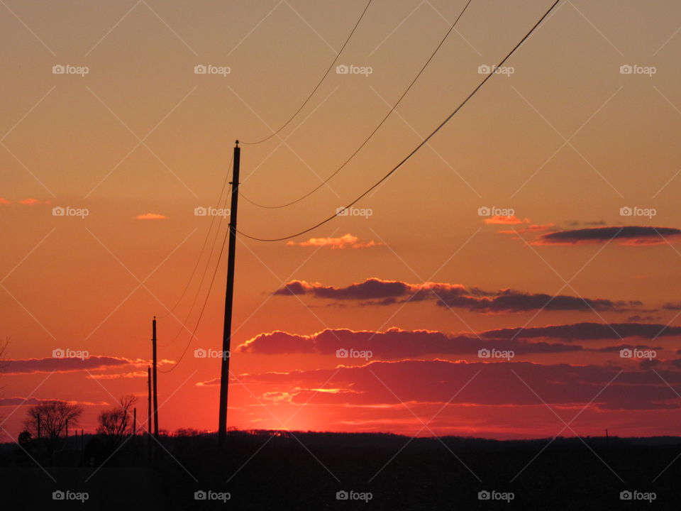Sunset and phone lines