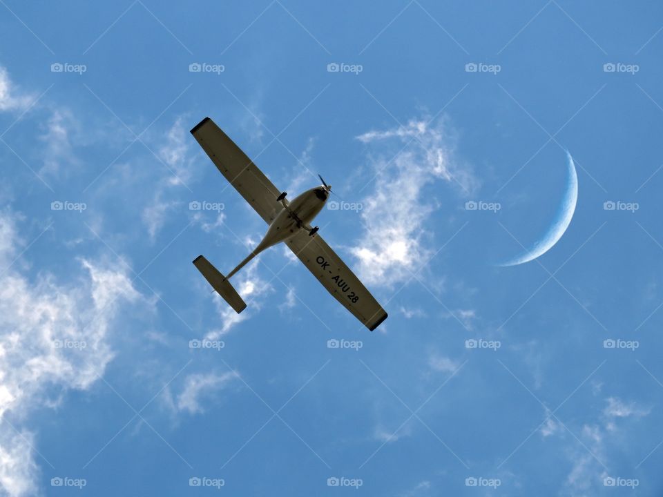 Plane and Moon