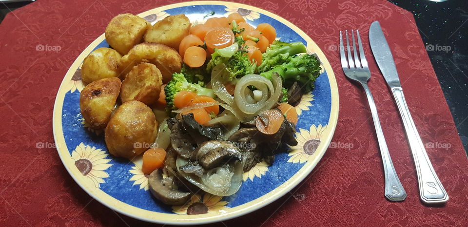 Vegetables potato and steak dinner