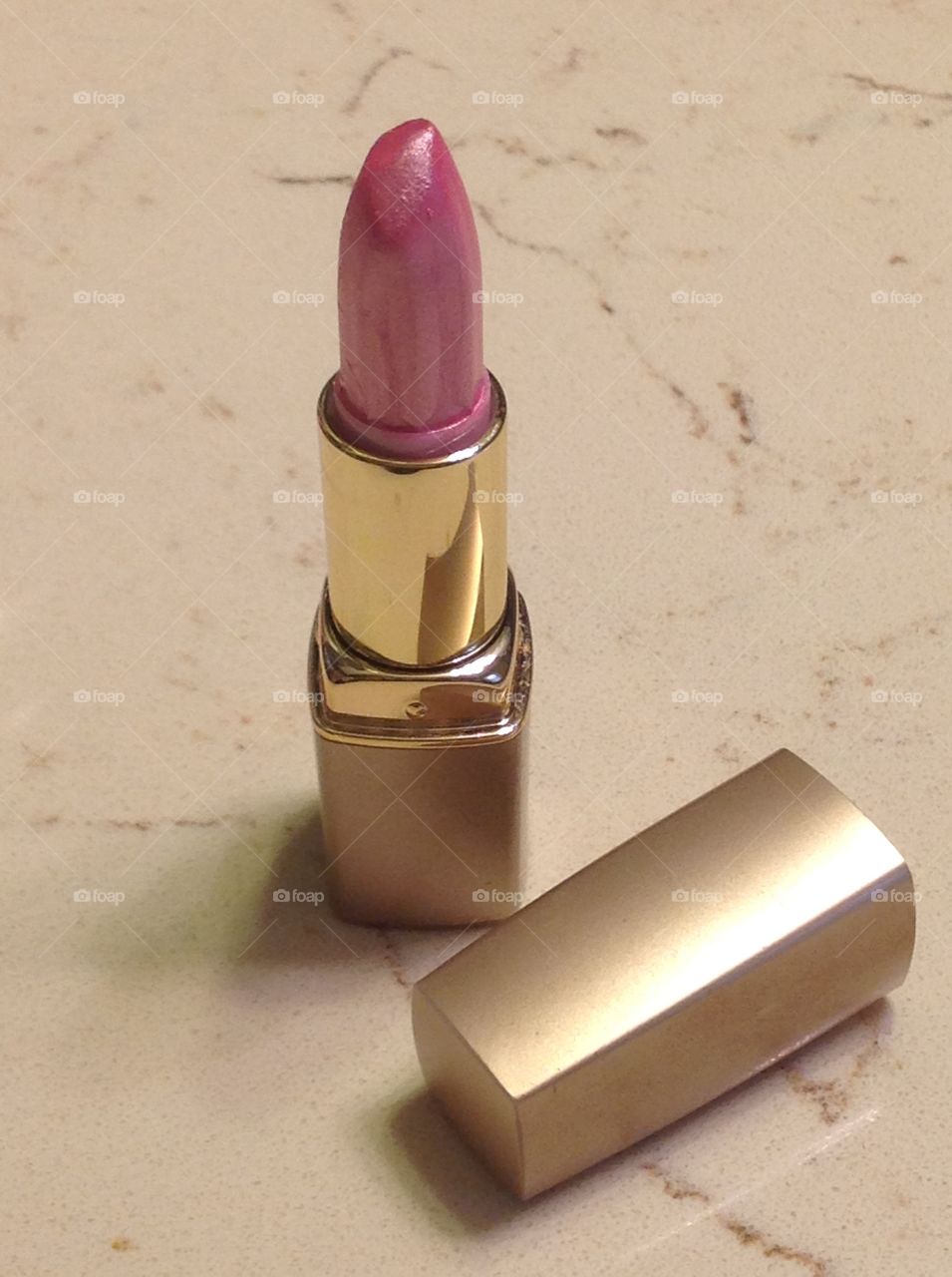 Pink lipstick.